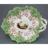 A mid-nineteenth century porcelain hand-painted Alcock handled dessert dish, c. 1830-50.  It is