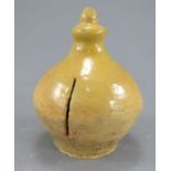 A sixteenth century Borderware slipware small-size money box. It has thin opening for the thin