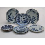 A pair of 19th century Chinese export blue and white 28cm diameter plates, each decorated with
