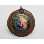 An Aesthetic period circular plaque, decorated in enamels with a seated mermaid, bubbles and