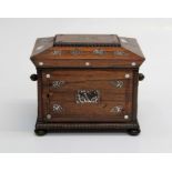 A Victorian rosewood, mother of pearl inlaid jewellery casket, the hinged top and front opening to