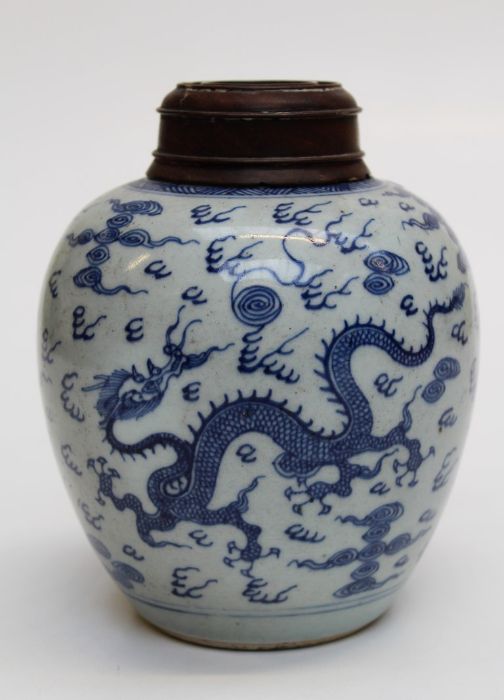 A 19th century Chinese blue and white jar of ovoid form, decorated with Dragon, Phoenix and