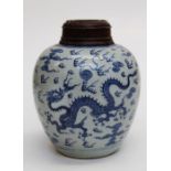 A 19th century Chinese blue and white jar of ovoid form, decorated with Dragon, Phoenix and