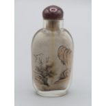 Chinese snuff bottle. Inside painted glass, of flattened rectangular form on a raised flat oval