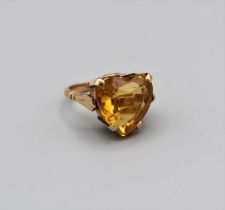 A heart shaped citrine cocktail ring in yellow metal, stamped 18k, size J, gross weight 8.0gm