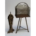An Edwardian brass and mahogany revolving magazine stand, together with a brass peacock firescreen