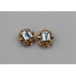 A pair of Aquamarine and yellow metal ear clip, stamped 18k, gross weight 7.7gm