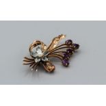 An Amethyst, cultured pearl and aquamarine spray brooch, marked 9ct , 9.2gm approximately