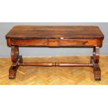 A late Regency rosewood library table, the rectangular top over two frieze drawers opposed by