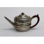 Solomon Houghman, a George III silver teapot of ribbed oval form, engraved with leafy bands around