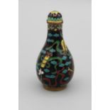 Chinese snuff bottle. Metal cloisonné of baluster shape with a circular raised footrim, a