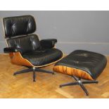 After Charles and Ray Eames, a rosewood veneer shell and button black hide upholstered lounge