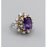 An unusual Amethyst and diamond set cocktail ring, in 18ct white gold with a distinctive star