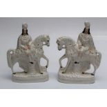 A pair of Victorian Staffordshire figures, each of a Nobleman on horseback, 39cm high