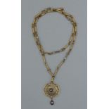 An Edwardian seed pearl and Amethyst lavaliere pendant, approximate weight 4gm. In yellow metal,