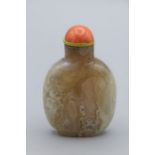 Chinese snuff bottle. Macaroni agate of compressed ovoid form resting on a broad oval footrim,