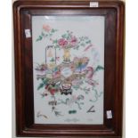 A late 19th/early 20th century Chinese famille rose porcelain plaque, decorated with flowering