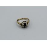 A sapphire and cubic zirconia 9ct gold ring, gross weight 1.5gm, size J1/2