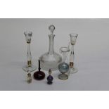 A small collection of glassware including three contemporary scent bottles, facet cut decanter and