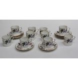 A set of ten Royal Worcester June Garland coffee cans and saucers. Printed marks