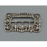 A sterling silver nurses belt buckle, hallmarked Birmingham 1972, 36gm approximate