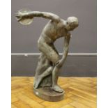 A 19th century lead garden statuette, modelled as the Discobolus of Myron, on oval plinth, 65.5cm