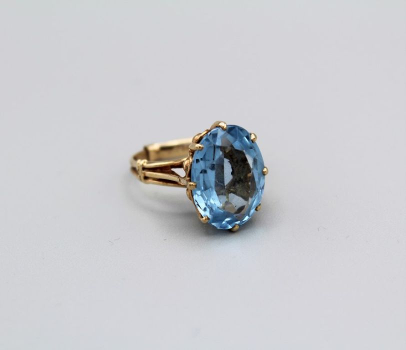 A synthetic spinel cocktail ring in 9ct yellow gold, gross weight approximately 5.6gm including a