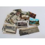 A collection of several dozen largely early 20th century postcards, the majority UK topographical