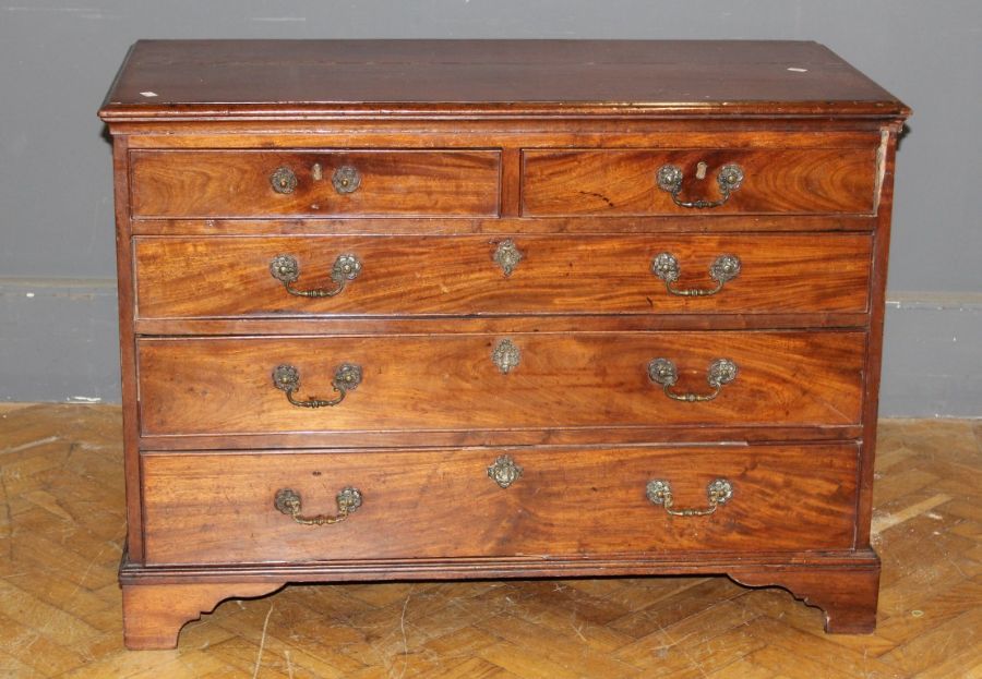A George III mahogany chest, the crossbanded rectangular top over two short and three long graduated