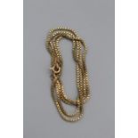 A 375 stamped yellow metal box chain, 24 inches. Approximate weight 10.0 gm