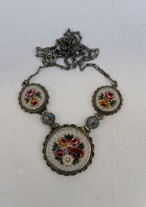 A micro mosaic necklace made up of five panels in white metal. In excellent condition