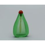 Chinese snuff bottle.  Glass of pale green monolithic material, of extremely thin flattened pear