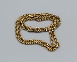 A 9ct hallmarked diamond cut curb link chain with bolt ring fastener, gross weight approximately