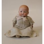 An early 20th century Armand Marseille bisque head baby doll. Numbered 371/3. Closed mouth, sleeping