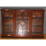 An Edwardian mahogany, satinwood banded dwarf bookcase, the rectangular top over swag barred