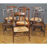 A pair of George III oak dining chairs, each with pierced splat, solid seat with thumb moulded
