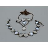 A moonstone necklet, with a matching bracelet in a vintage case