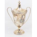 A George V silver two handled presentation cup, engraved inscription reads: R.N HUNT CLUB - Heavy
