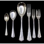 An extensive German 800 standard silver ornate flatware service by Posen, each handle engraved