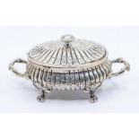 A Continental 800 standard silver oval two handled small dish and cover, the gadrooned body chased