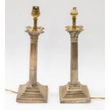 A pair of late Victorian silver Corinthian column candlesticks, hallmarked London, 1899, maker's