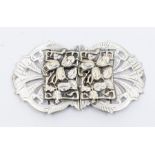 An Edwardian EPNS Nurse's belt buckle, floral decorative central panel with engraved decoration,