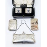 A collection of silver to include:  a pair of George V boxed engine turned napkin rings,