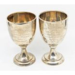 Two early 20th Century presentation silver goblets, both hallmarked by Walker & Hall, Sheffield,