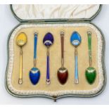 A set of six early 20th Century Norwegian Harlequin silver gilt and enamel spoons, peacock pattern