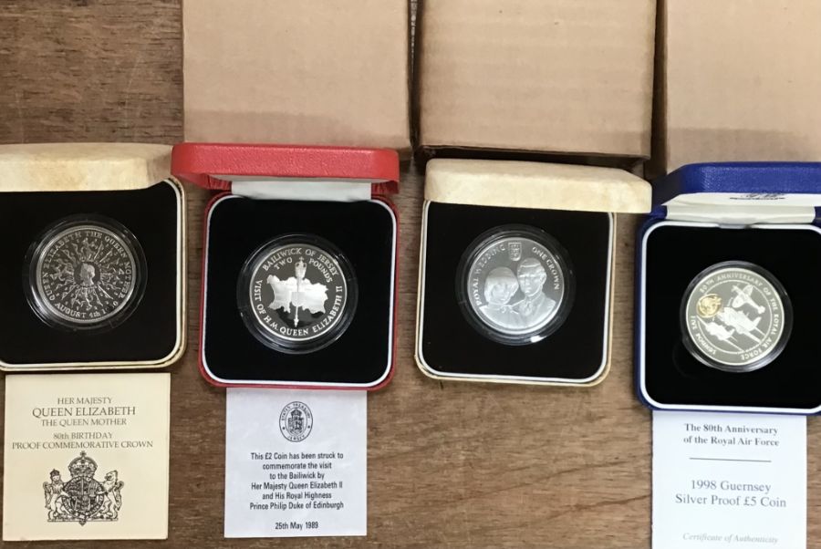 Royal Mint Silver Proof Coins in Original Case with Certificate of Authenticity for three of them.