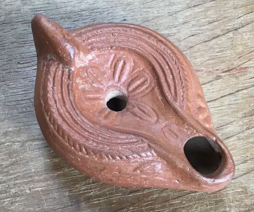 Late Roman North African Grave Offering Decorated Samian oil lamp. Approximately 11cm long and 4.5cm