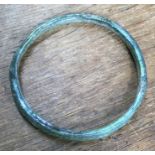 Rare Roman funeral offering green glass Bangle, North African. Approximately 8cm diameter & 8mm