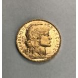 French 1904 gold 20 franc coin.