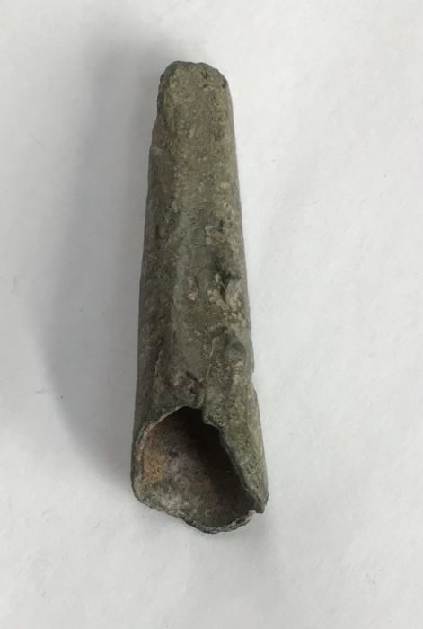 Middle to late Bronze Age (1500-800BC) copper socketed spear centre with broken tip and lower